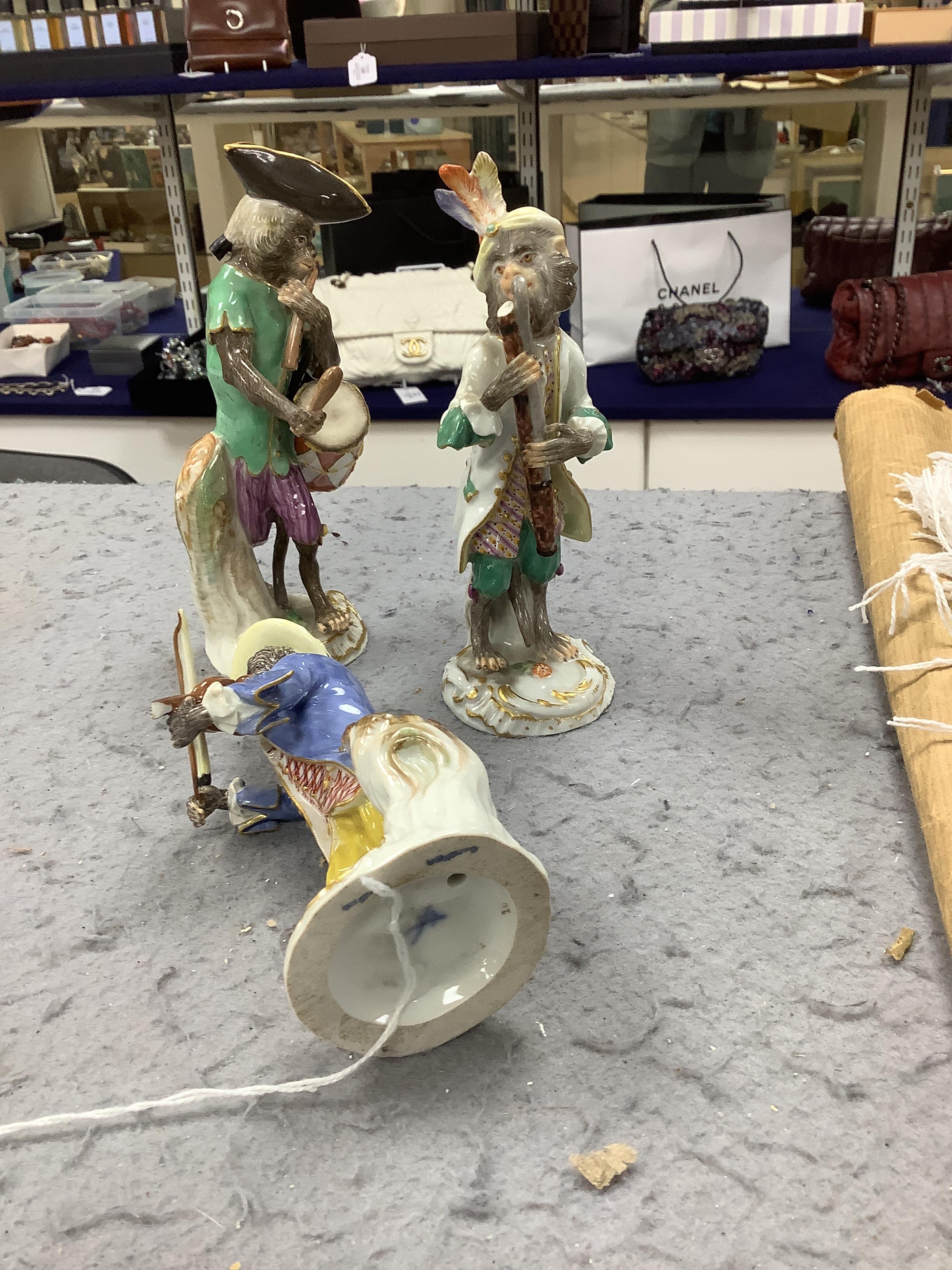 A 19th century four piece Meissen monkey band and a pair of Sampson pheasants